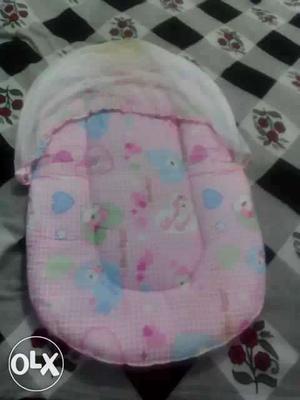 Baby's Oblong Pink And White Cushion