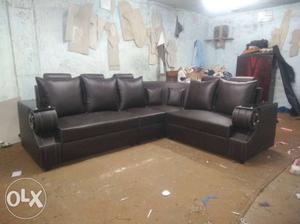Brown Leather Sectional Sofa With Throw Pillows and whole