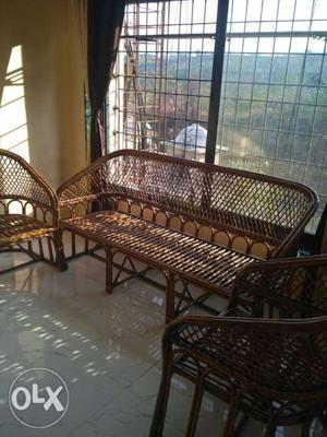 Brown Wicker Armchair And Table