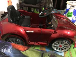 Red And Black Electric toy car. Excellent condition
