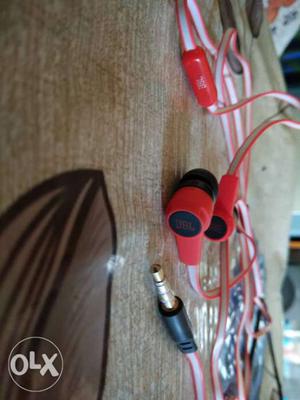 Red And Black Corded Headphones