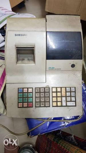 White And Black Samsung Cash Register