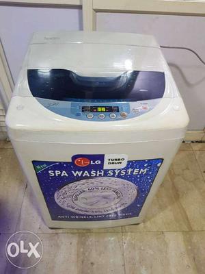 White LG Top-load Fully-automatic Washing Machine