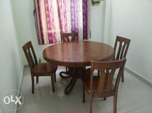4 Seater Round Pure wooden Dinning table set for sale.