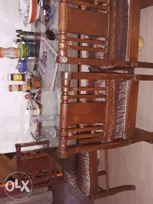 Brown Wooden dining Table With 4 Chairs in good condition