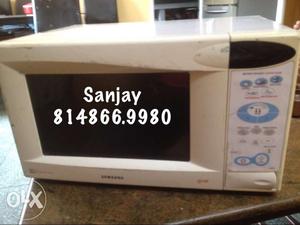 Samsung brand 27 Ltrs microwave oven with power