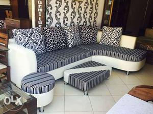 White And Black Fabric Sectional Sofa With Throw Pillows