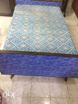 6X5 Wooden bed. Price can be negotiable.