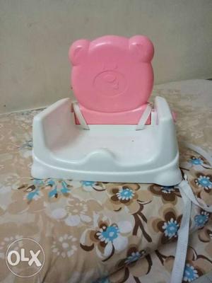 Baby's White And Pink Highchair