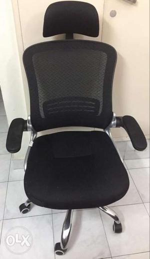Black Fabric Office Chair with wheels, in a good
