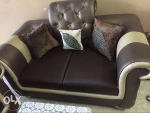 Black Leather Sofa Chair With Throw Pillows