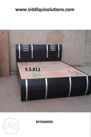 Black colour and silvar strips Brand new queen size bed with