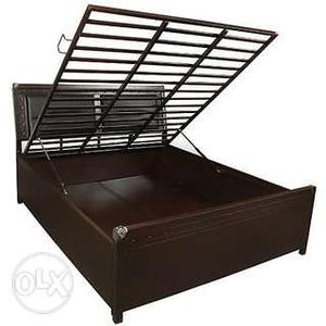 Brown And Black hydrolic metal Bed