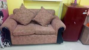 Brown Loveseat And Throw Pillows