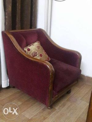 Brown Wooden Framed Red Padded Armchair