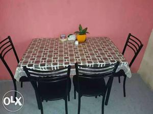 Dinning table with four chairs