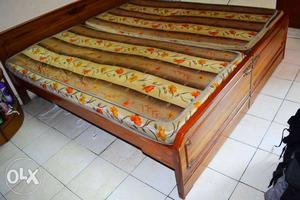 Double wooden bed with two matresses