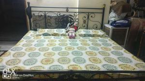 Heavy iron king size bed in excellent condition.