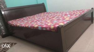 King size wooden bed with internal storage for immediate