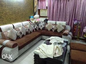 L shape 6 seater sofa with 2 puffy