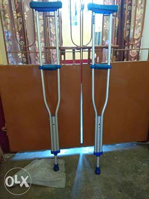 Pair Of Gray Steel Crutches Walker