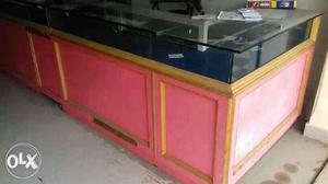 Pink And Brown Wooden Display Counter