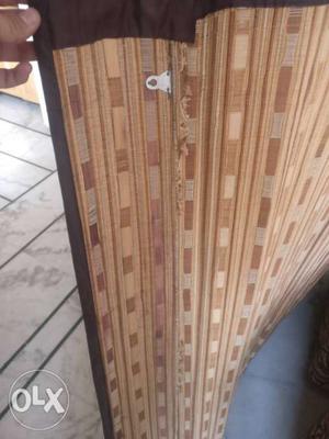 Retractable wooden curtain. Hangable on doors,