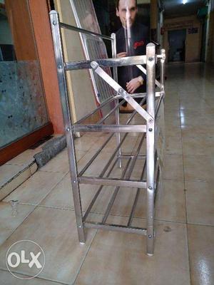 Stainless silver shoe rack