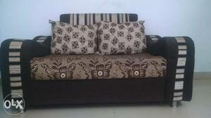 Two seater sofa, with two side extra attachment