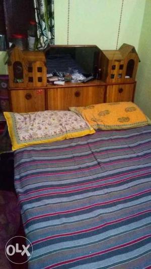 Wooden single bed sell urgently my 99 seven 11 nine Nine 5