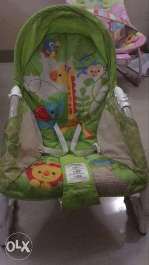 A fisher price rocking chair.. hardly used just
