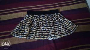 A printed frilled mini skirt, 12 inches long for