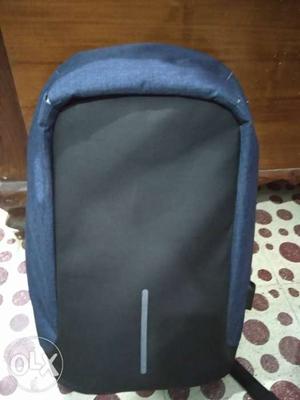 Anti theft USB charging backpack 1 week used,
