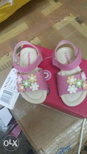 Baby's Pink And White Shoes