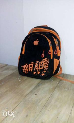 Black And Orange Apple Backpack