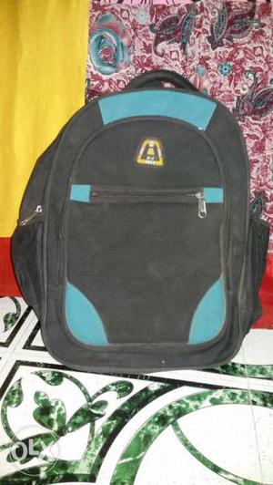 Blue n black backpack laptop compartment upto