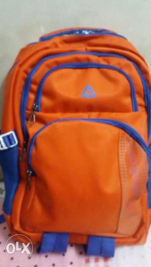 Brand new reebok bag orange in colour. it has 4
