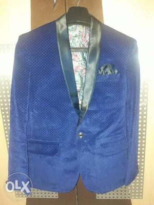 Branded blue coloured blazer with shining black