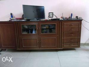 Brown Heavy Wooden TV Cabinet at very cheap rate.
