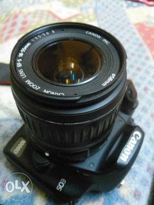 Canon EOS D with lens (mm), charger,