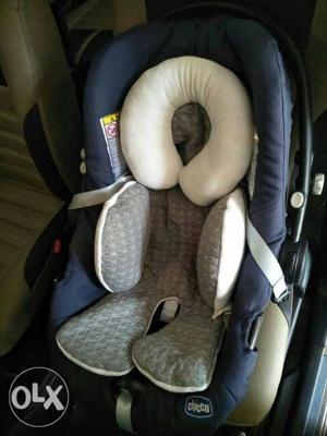 Chicco car seat with cushion. original price