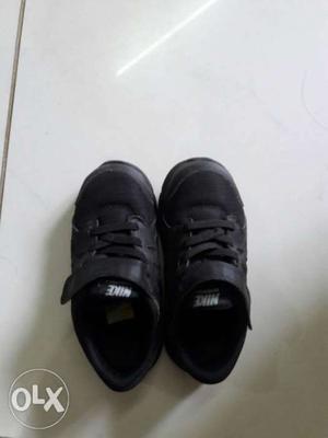 Children's Pair Of Black Nike School shoe