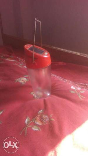 Clear And Red Plastic Bottle