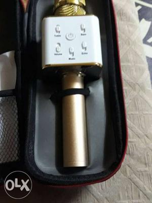 Gold And White Bluetooth Microphone