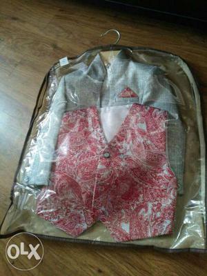 Gray Sherwani Robe And Red Vest With Plastic Bag