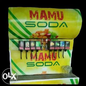 Green And Yellow Mamu Soda Drinks Dispenser
