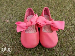 Pair Of Pink Leather Shoes