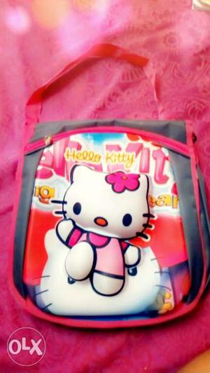 Pink and grey colored hello kitty bag for small