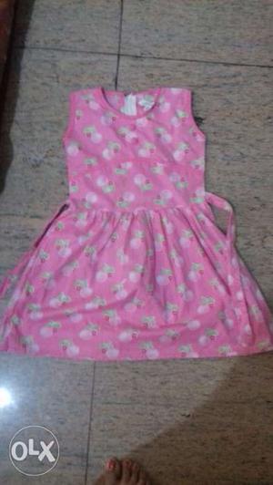 Pink cotton frock with white pòlka dots n apple