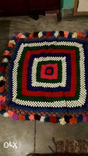 Red, Blue, And White Knitted Textile